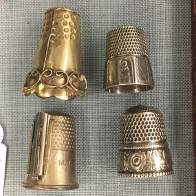 Four silver thumbles