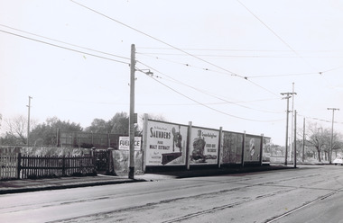 Photograph, Advertising hoarding, Ormond Rd and St Kilda St junction