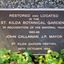 Rectangular metal plate inscribed with the words: Restored and located in the St Kilda Botanical Gardens in recognition of his mayoral year 1985-86. John Callanan, JP,  Mayor. St Kilda Garden Festival 26th October 1986