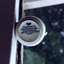 Bottom of white cup showing the image of a crown and the words "Dunn Bennett's (Gold Medal) Hotel Ware Burslem, England, Made for: J Leigh Jones & C Sydney"