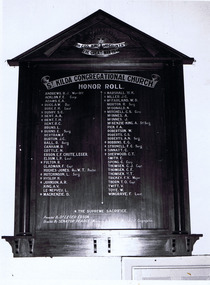 Black and white image of a wooden plaque inscribed as follows: For God, King and Country. The Great War 1914. St Kilda Congregational Church. Honor Roll. Names of all those who served are then listed. Those who died have an asterisk next to their name. The list of all who served is as follows: Andrews R J; Acklon F E Corp; Adams E A; Bugg A W Dvr; Bugg E H Lieut; Busby S C; Bent A A; Bent T H; Bent R C; Bruns L; Burns E Serg; Bertram F; Burton J C; Ball R Serg; Canham R; Cottle N; Ersson E F Chute, Leger; Elsum L P Lieut; Fulton R; Gladman F Capt; Hughes-Jones Rev W T  Pastor; Hutchinson L Serg; Hyslop H; Johnson A R; King A V; Le-Nepveu L; Mackenzie D; Marshall W K; Miller J C; McFarland W d; Morton R Serg; McDonald N; Mitchell G S Corp; McInnes A; McInnes J; McKenzie-King A Stf Serg; Pick F A; Robertson W; Roberts C S; Roberts A N Serg; Robbins E G; Stronell F C Serg; Sinnatt C; Sherwood C T; Smith E; Spong C Corp; Thomsen C J Capt; Thomsen C F; Thomsen V T; Trickey F V Major; Thorn T O Cape; Twitt V; Toye W; Wingrave F Lieut