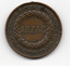 Circular brown medallion with words around the circumference Dept of Education Victoria Lest We Forget 25 Apr 15. In the centre a wreath surrounds the word ANZAC. 