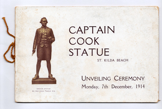 A bronze statue of Captain Cook and the title of the booklet.