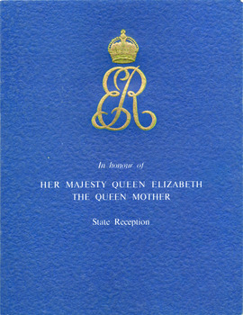 Gold Crown and letters ER on blue field, above the words printed in white, that read In Honour of Her Majesty Queen Elizabeth the Queen Mother, state reception