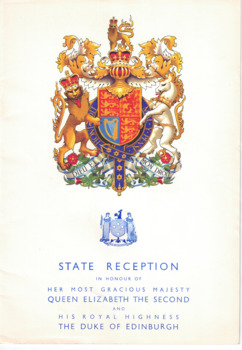 A coloured image of the Royal Coat of Arms at the top of the front cover, above a small rendering of the Victorian Coat of Arms. Followed by words printed in blue, that read State Reception In Honour of Her Most Gracious Majesty Queen Elizabeth the second and His Royal Highness the Duke of Edinburgh.