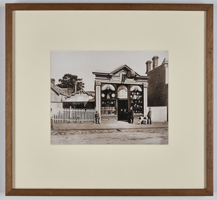 Photograph - Building, Levitt's clock shop