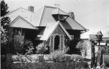 Photograph, Log Cabin c 1930's with Iron roof