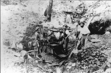 Photograph, Mining Scene at Quartz Reefs, St Georges Lead.  Three miners with a gold rocking cradle