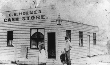 Photograph, Mr G.R. Holmes's Store on corner of Grant and Skene Streets. Formerly Crown & Anchor Hotel