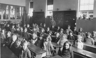 Photograph, Stawell State School Number 502 with students in a classroom with Miss Matheson as the Teacher 1930