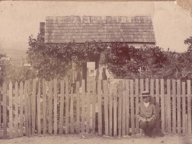 Photograph, 2 Gentlemen standing in front of weatherboard home -- Swalwell & Eastlake families