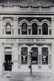 Photograph, State Savings Bank Stawell with three employees in doorway
