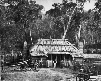 Photograph, Delley’s Wooden Cottage with bark roof wooden chimneys and fence near the entrance to Halls Gap by Fyans Creek