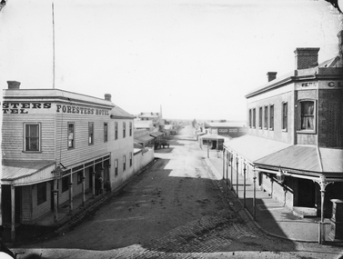 Photograph, Main Street & Patrick Streets corner looking East down Patrick Street with the Foresters Hotel on left corner 1878