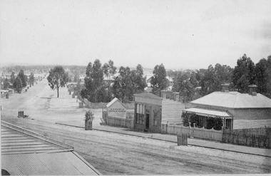 Photograph, Barnes and Scallan Streets intersection looking towards cemetery with Mr H Crouch's Undertaker Premises on the corner c1880's
