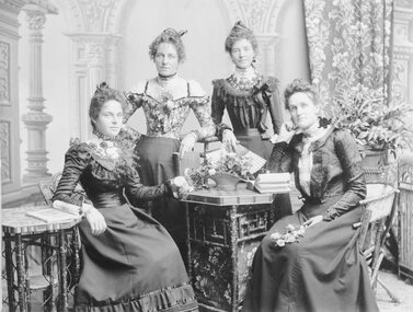 Photograph, Mr C Hewitt of the Stawell Photographic Company photographing 4 Ladies --  Studio Portrait