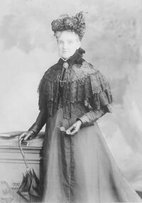 Photograph, Older Lady with umbrella and glasses -- Studio Portrait
