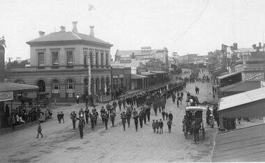 Photograph, Main Street Stawell  -- Procession passing the Post Office with a band and soldiers marching c1914-1918