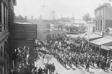 Photograph, Upper Main Street Stawell procession with the band & a police constable on Horseback visible c1901