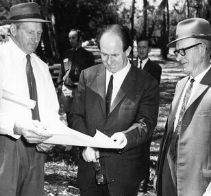 Photograph, Hall’s Gap Tourist Promotion Officer Mr Ian R. McCann in the centre studing Pool Plans 1970