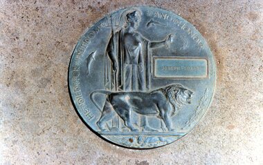 Photograph, "Dead Mans Penny" on the Grave of Joseph Scarsi who died from wounds inflicted in World War 1