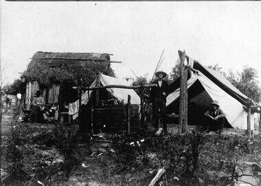 Photograph, Telford Langwarrin Camp Scenes -- Mr W.W. Telford standing with Mr R.M. Telford in front of Tent & Mr W. & Mr R. Mitchell in front of Slab Hut