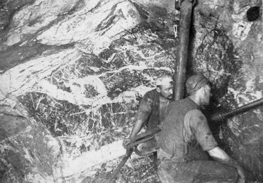 Photograph, "Magdala-Cum-Moonlight" Mine Looking North West & with 2 miners using a modern rock drill 1895