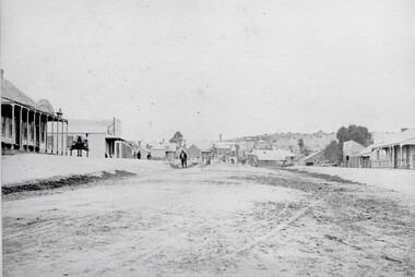 Photograph, Upper Main Street Reefs looking East towards Big Hill from the front of Joyce's Hibernian Hotel 1866