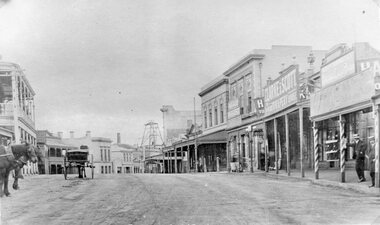 Photograph, Upper Main Street Stawell looking East with on left the 2 story Allingham building & behind the cart is the Commercial Hotel c1910 -- 2 Photos -- 1 Colour