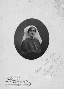 Photograph, Mrs Sarah Jane Proctor nee Unknown in Nurses Uniform 1918 -- Studio Portrait
