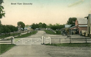Photograph, Glenorchy road Scene from the Rialway line with Mr M.W. Edwards & Son's General Store on the right -- Postcard