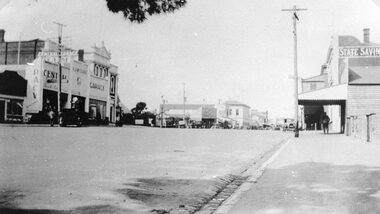 Photograph, Main Street Stawell looking East from St Georges Street with McClure's Garage, Post Office & the State Savings Bank on right 1930