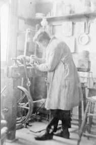 Photograph, Stawell Technical School Workshops with a student at work with a treadle lathe 1923-1924