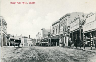 Photograph, Upper Main Street Stawell looking East with on leftthe 2 story Allingham building & behind the cart is the Commercial Hotel c1910