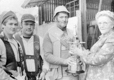 Photograph, Mr A Dart Memorial Trophy at the Stawell Gun Club -- L to R Mr Col Dooley from St Arnaud, Mr Phil Scott from Stawell, Mr Cec Blackley from Horsham with Mrs Maysie Dart presenting the Mr A Dart trophy
