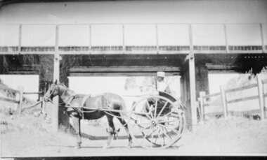 Photograph, Deep Lead -- Bunyip Bank Rail Crossing up-grade  with a horse & cart in font of the bridge.1933-1934