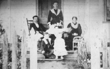 Photograph, Mrs Ann Griffin nee Beynon, at back with Mr Griffith at the front left, their 2 children then Mrs Ann Beynon nee Unknown on the right