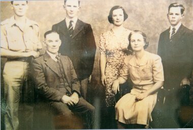 Photograph, Mr Frank Bennett & Mrs Kathleen Bennett nee Egan from Deep Lead with family from L to R is Charles, Neil, Lesley & Lawrie 1940's -- Studio Portrait