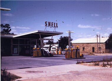 Photograph, Lodestone Service Station Cnr Seaby & Longfield Streets Stawell with the Stone Cob & Co Stables in Seaby Street clearly seen in background of photo