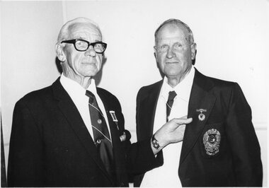 Photograph, Mr George Parry -- on the right -- receiving a Bowls Veteran’s Badge