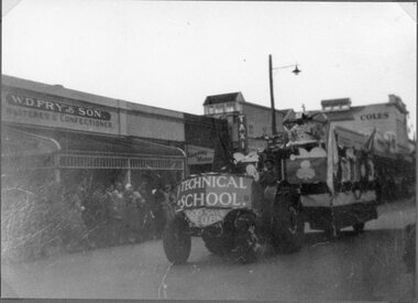 Photograph, Coronation Procession  with the Stawell Technical School Float & the W D Fry & Sons Confectioner store on the left 1952