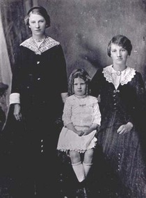 Photograph, Wood Family photo with youngest daughter to later be Mrs Jean Hughes -- Studio Portrait