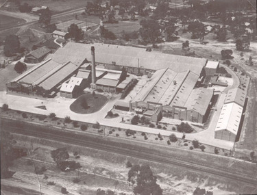 Photograph, North Western Woollen Mills with the Rail line in foreground -- Aerial View
