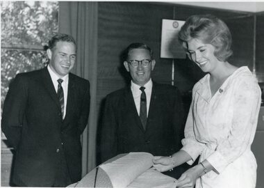 Photograph, North Western Woollen Mills -- Mr J M Bennett & Mr G S Bennett with a young Employee