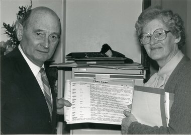 Photograph, Stawell Historical Society's Mr Alan Kingston receiving Cemetery Records from Mrs Dorothy King nee Unknown