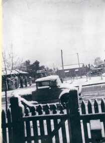 Photograph, Lower Main Street in Snow 1949 -- looking back towards Barnes Street