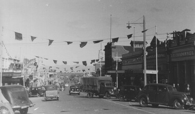 Photograph - Upper Main Street looking West, Upper Main Street with Bunting looking West & Named Shops in 2nd Photo -- 2 Photos