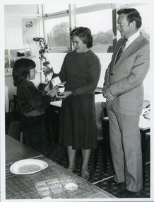 Photograph, Stawell West Primary School Number 4934 -- Mrs Marie van Leeuwen nee Unknown accepting flowers from the School & Principal Mr Noel Thomas