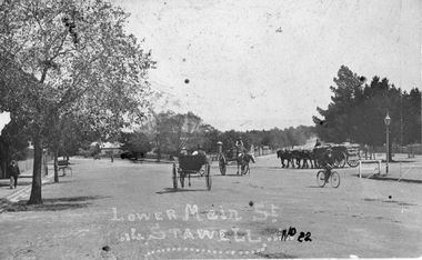 Photograph, Lower Main Street Stawell and Barnes Street corner with cemetery in distance on right. c1905
