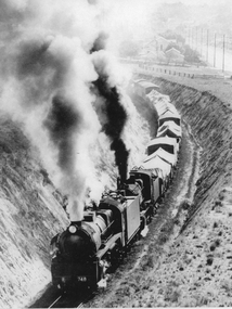 Photograph, R 748 Class Steam Engine pulling freight in cutting
